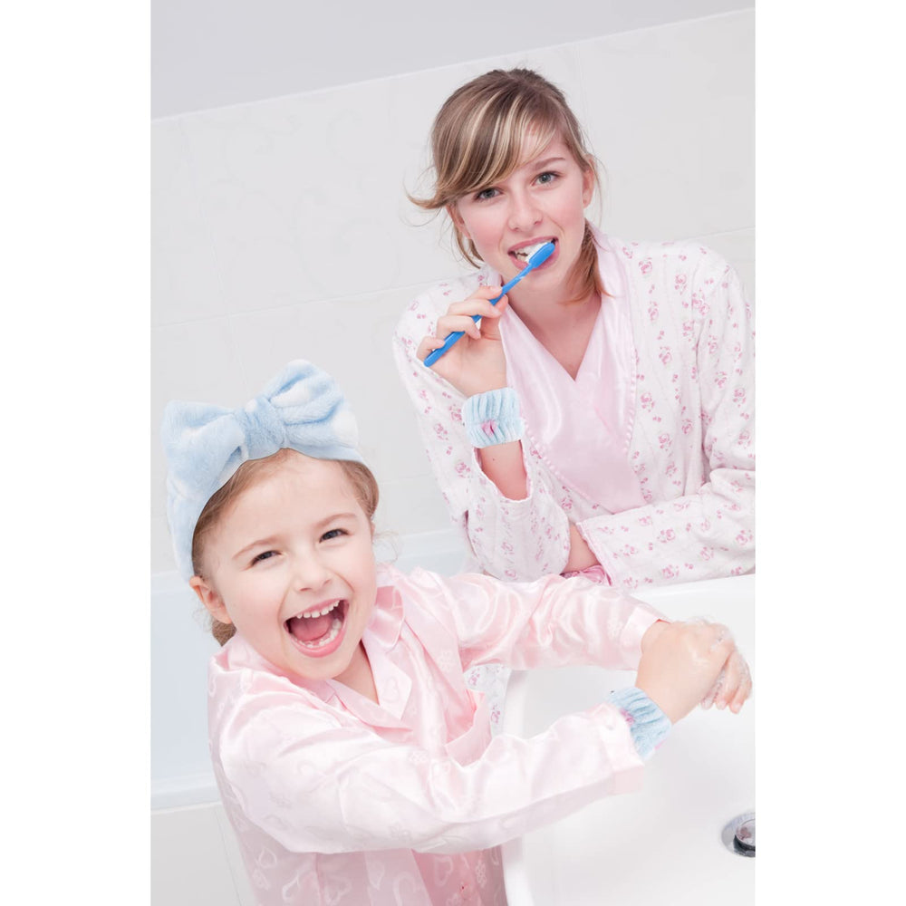 Muñequera Tihebax de microfibra absorbente rosa para spa.