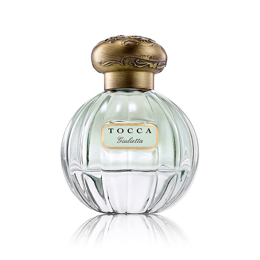 Tocca Giulietta bottle front with pink tulips and green apple, ideal daily fragrance.