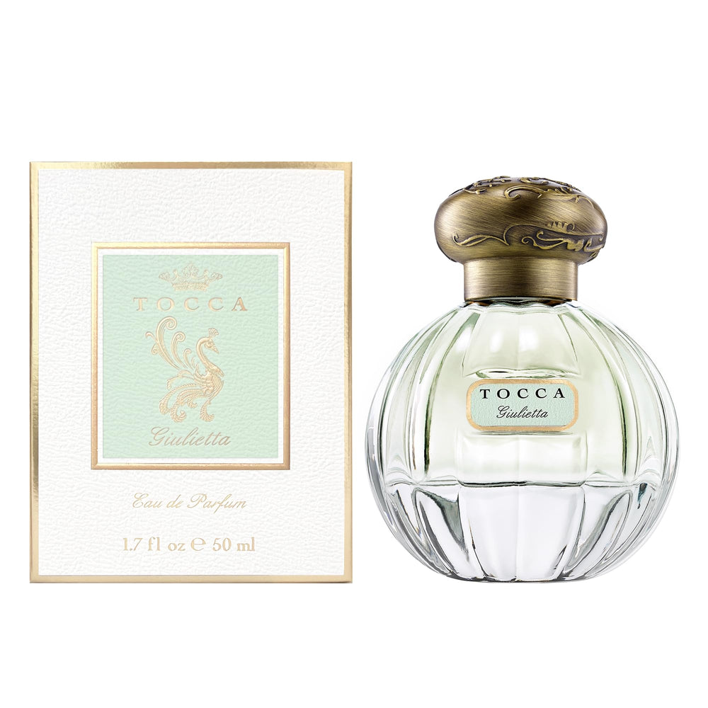 Tocca Giulietta bottle top close-up highlighting vanilla orchid and lilac for elegant aroma.