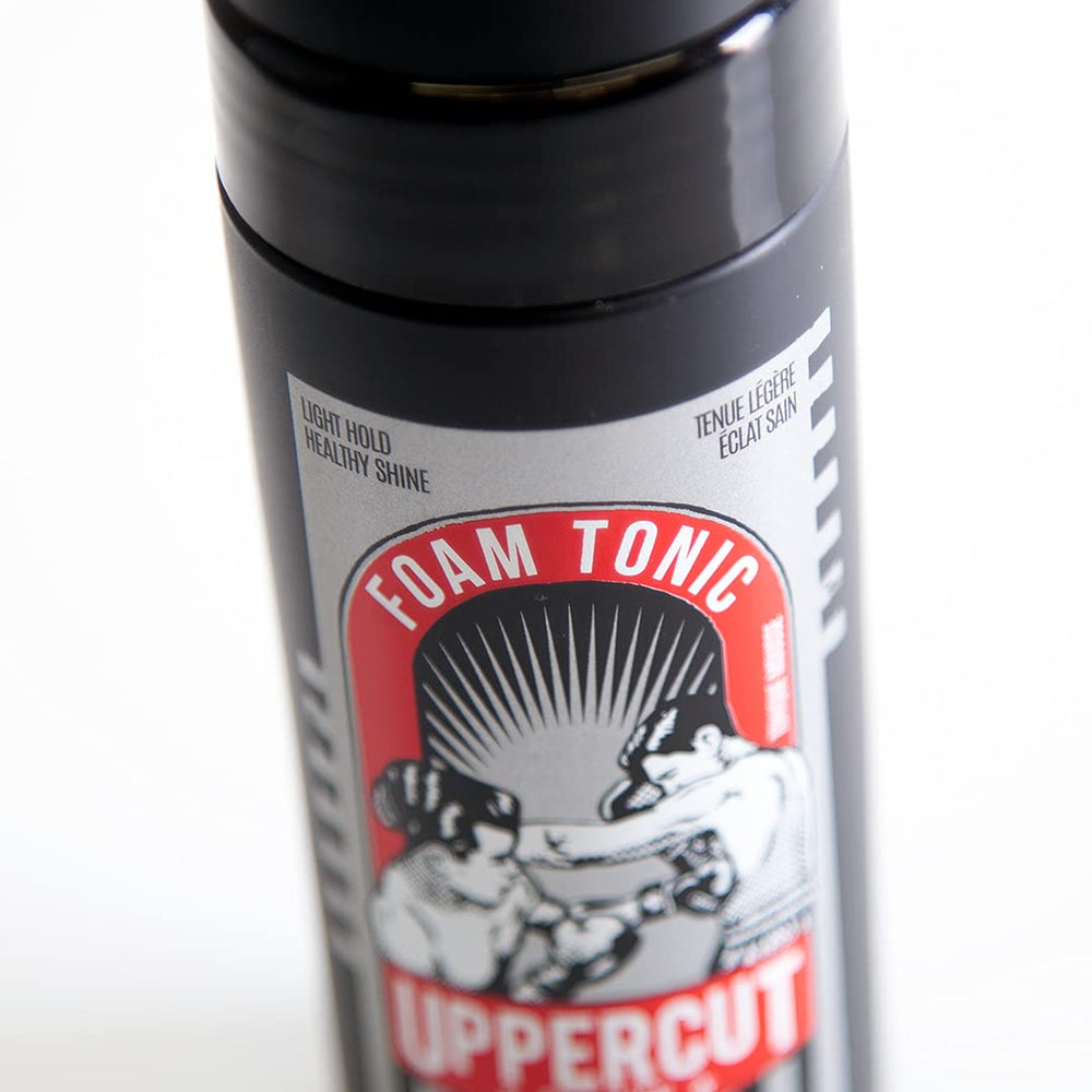 Protección de calor con quinoa y vitamina B5 en Tonico-Espuma de Uppercut Deluxe.