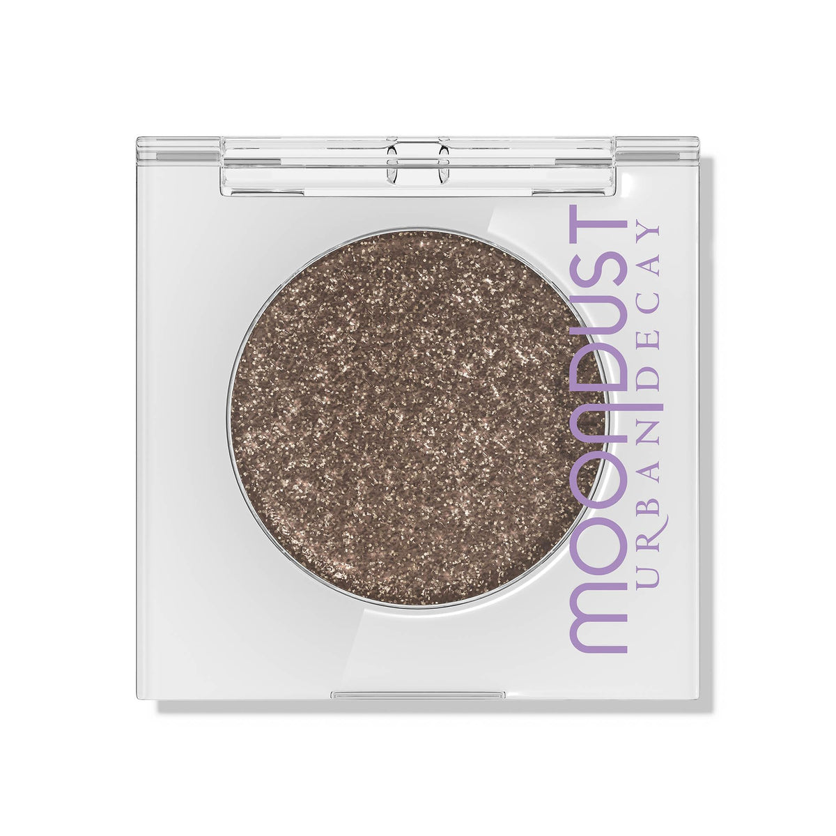 Sombra Moondust Space Cowboy de Urban Decay, brillo champán y duración prolongada.
