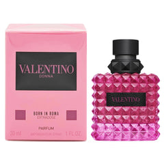 Valentino Born in Roma Extradose, botella rosa, aroma floral-ámbar para días y noches.