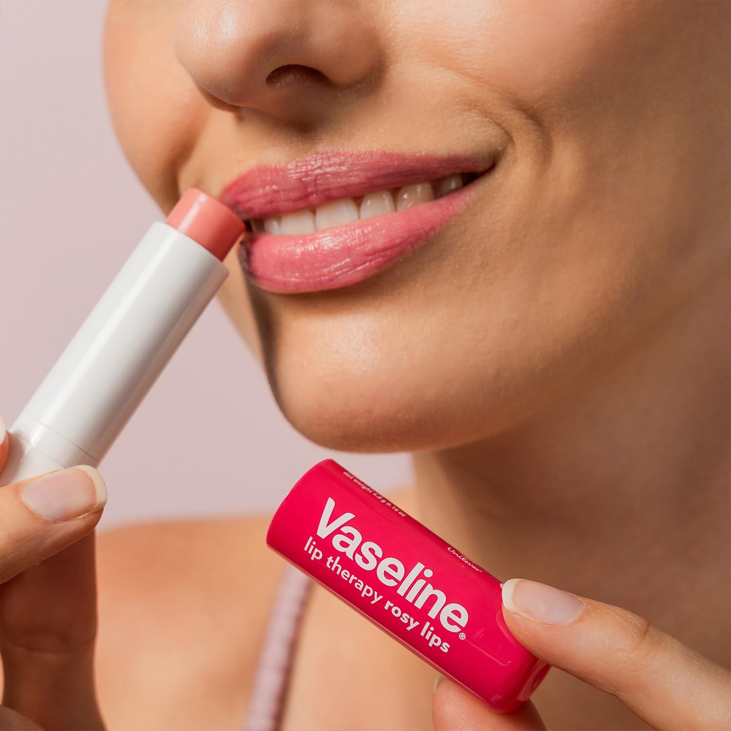 Vaseline Labial Rosado con vitamina E, color y humedad en labios.
