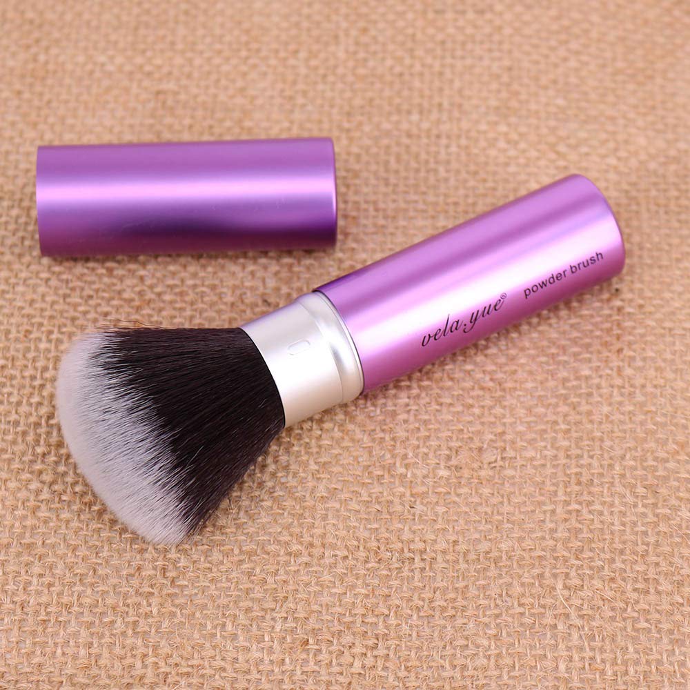 Vela.Yue estuche de aluminio violeta protege la brocha durante la jornada.