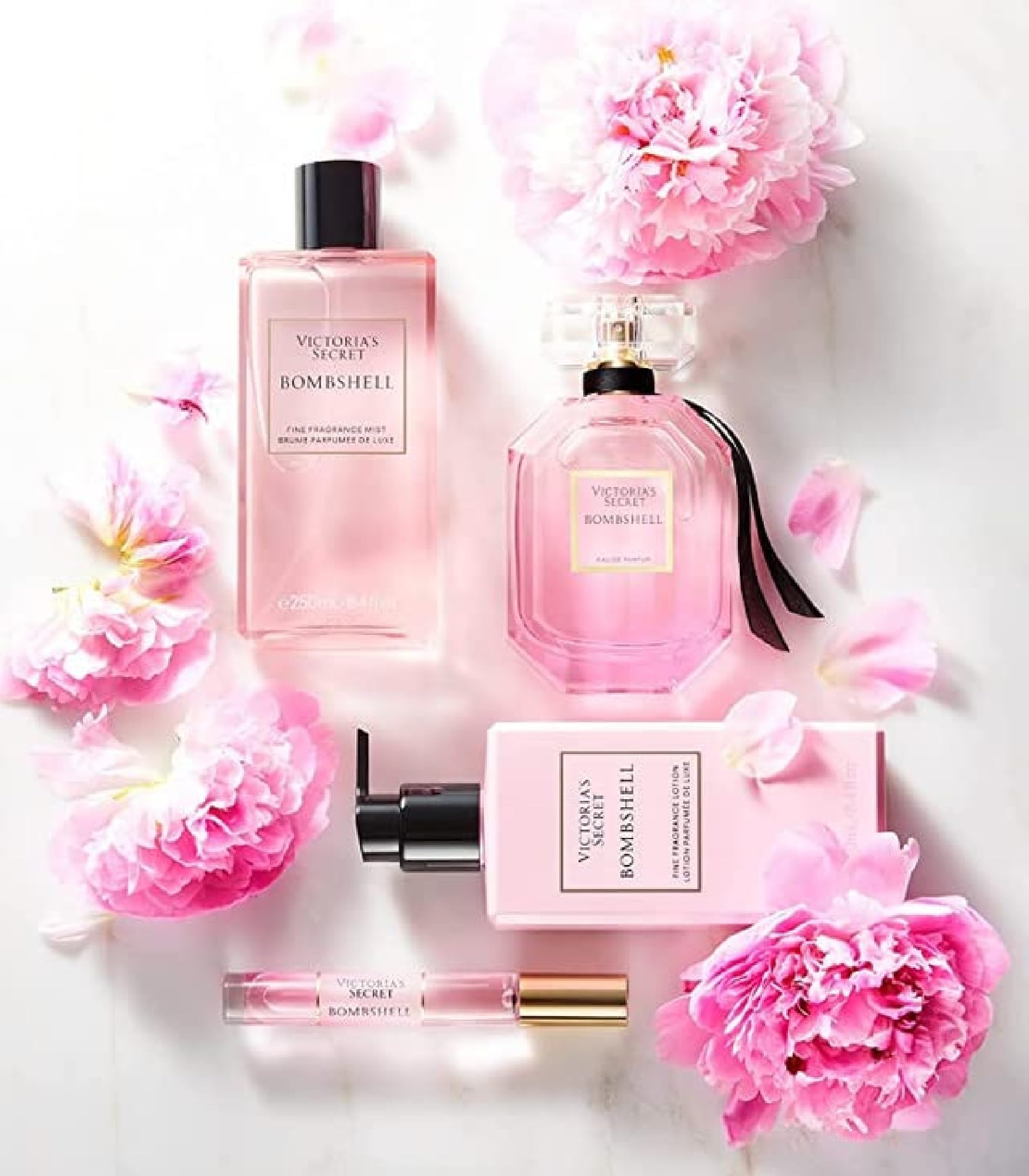 Notas florales Bombshell, perfume en botella, perfecto para ocasiones especiales.