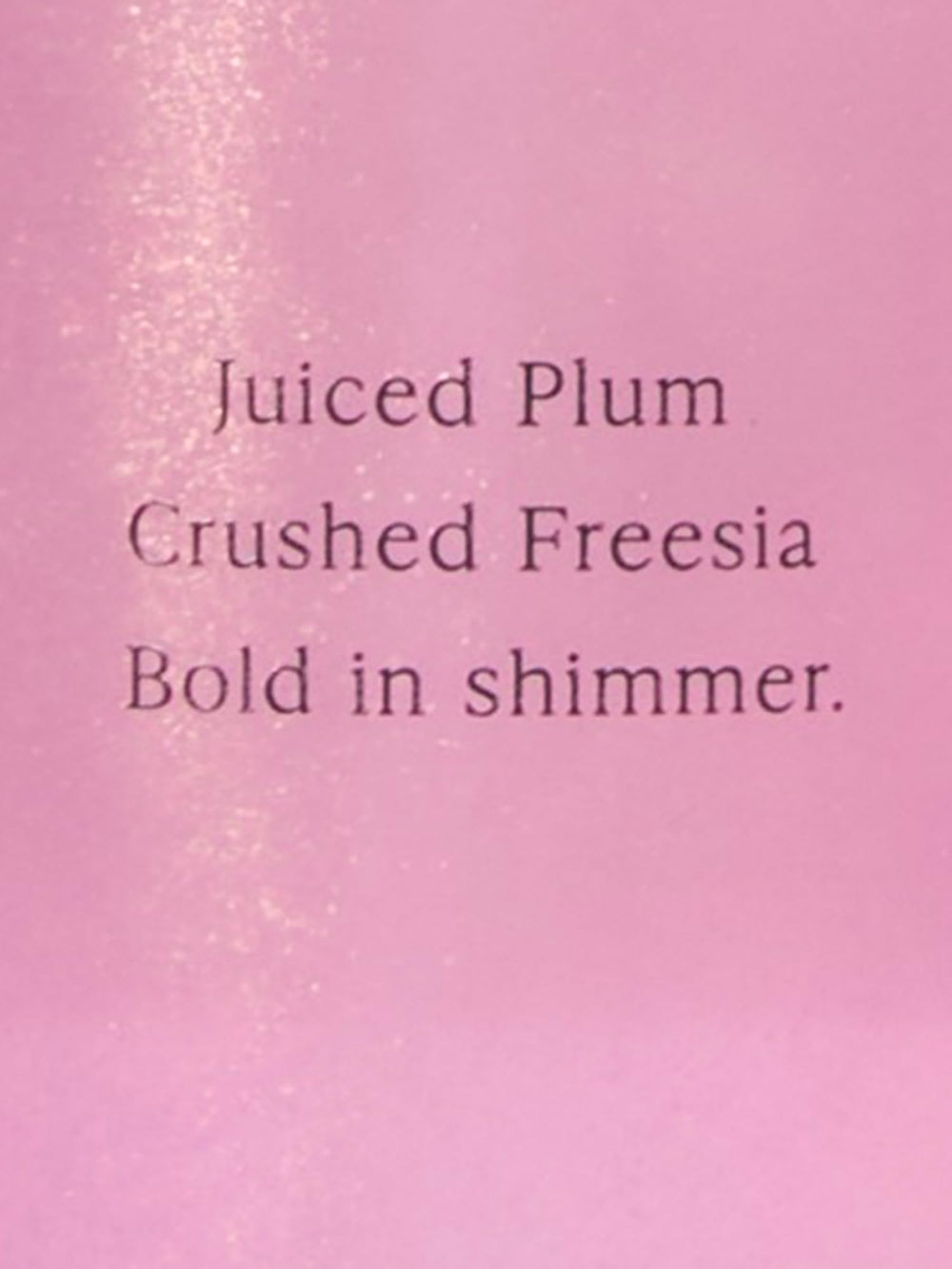 Frasco rosa de Victoria's Secret Pura Seduction con etiqueta atractiva.