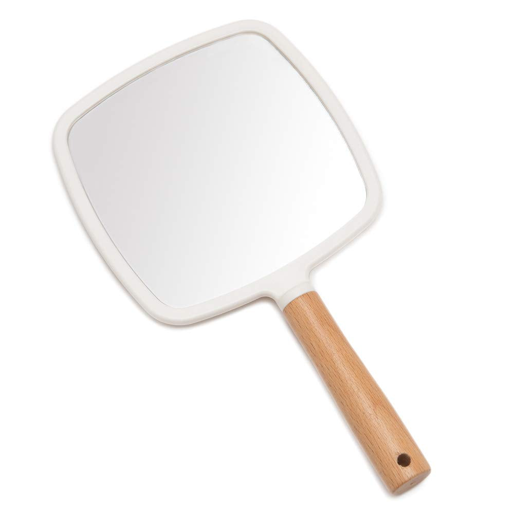 Espejo de mano YEAKE con mango de madera, perfecto para retoques precisos sobre la marcha.